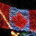 Picture of the Canadian Maple Leaf flag, all made out of red and white Christmas lights